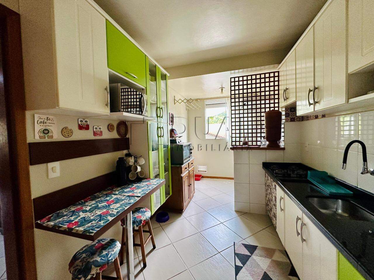 Imagem Apartamento à Venda na Barra do Rio Molha – 2 Quartos e Sacada com Churrasqueira