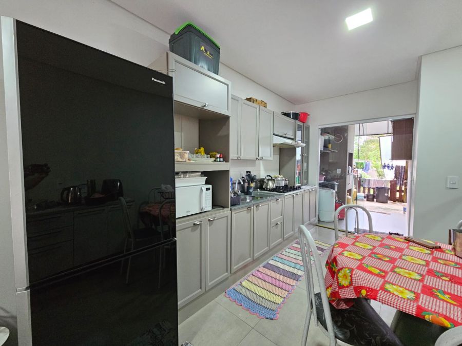 Imagem Casa geminada aconchegante, ideal para quem busca conforto, praticidade e contato com a natureza no dia a dia.